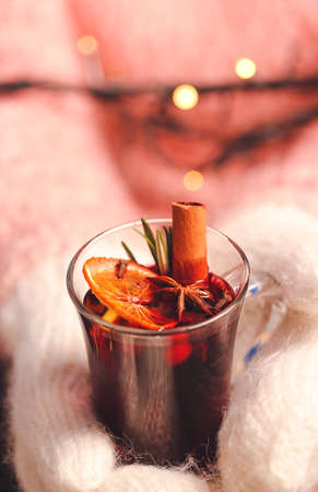 Woman with tasty mulled wine, closeupの写真素材