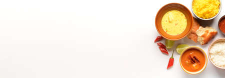 Traditional Indian food on white background with space for textの写真素材