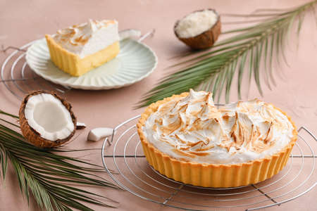 Tasty coconut pie on color backgroundの写真素材