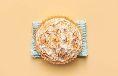 Tasty coconut pie on color backgroundの写真素材