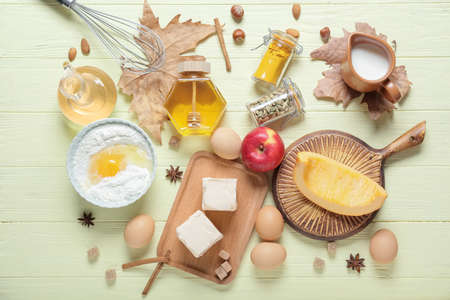 Ingredients for preparing pumpkin pie on color wooden backgroundの写真素材