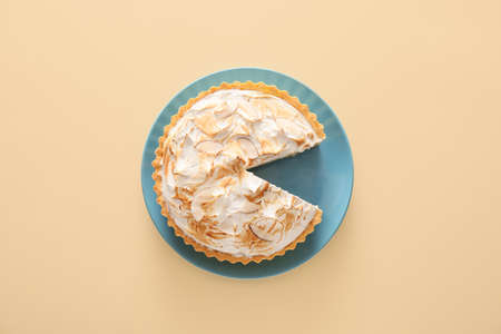 Tasty coconut pie on color backgroundの写真素材