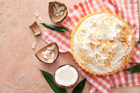 Tasty coconut pie on color backgroundの写真素材
