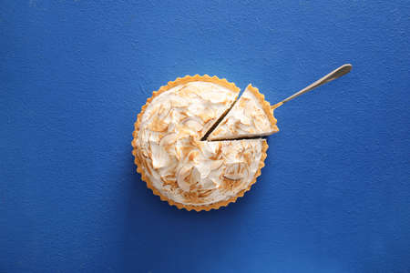 Tasty coconut pie on color backgroundの写真素材
