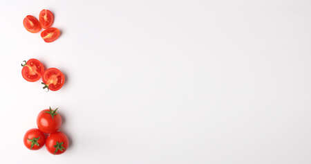 Fresh ripe tomatoes on white background with space for textの写真素材