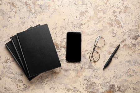 Composition with stack of books on grunge backgroundの写真素材