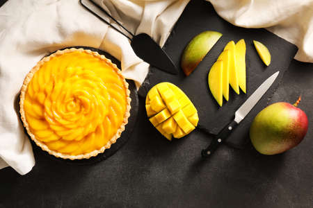 Tasty mango pie on dark backgroundの写真素材