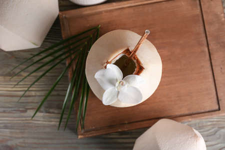 Fresh coconuts on wooden backgroundの写真素材