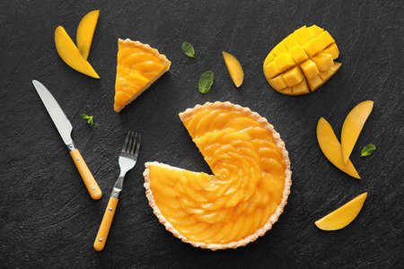 Tasty mango pie on dark backgroundの写真素材