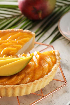 Tasty mango pie on light backgroundの写真素材