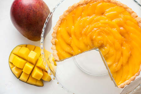 Tasty mango pie on light backgroundの写真素材