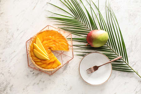 Tasty mango pie on light backgroundの写真素材