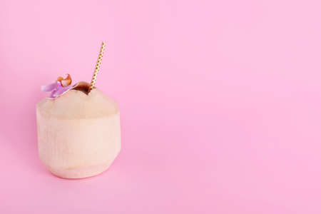 Fresh coconut on color backgroundの写真素材