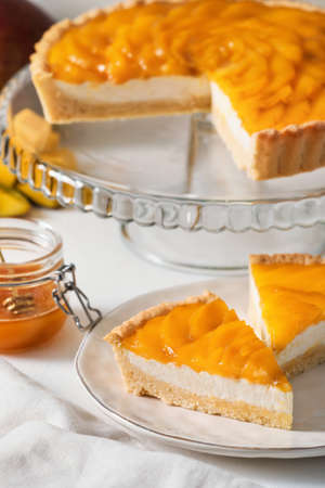 Tasty mango pie on light backgroundの写真素材