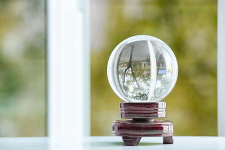 Crystal ball of fortune teller on tableの写真素材