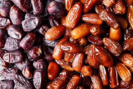 Sweet dried dates as backgroundの写真素材