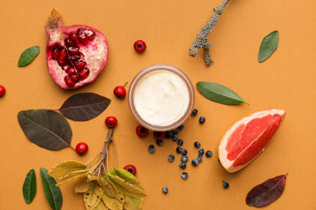 Composition with jar of natural cream on color backgroundの写真素材