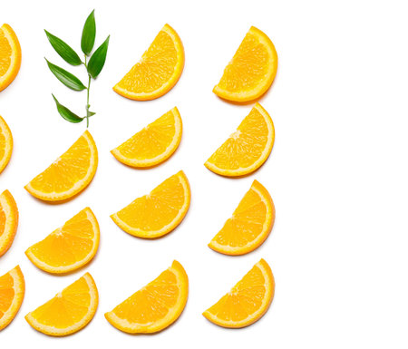 Slices of fresh oranges with green leaves on white background