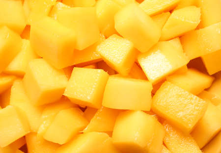 Sweet cut mango as background