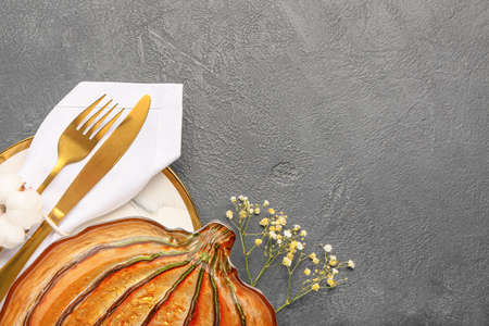 Beautiful table setting for Thanksgiving Day celebration on dark backgroundの写真素材