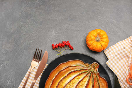 Beautiful table setting for Thanksgiving Day celebration on dark backgroundの写真素材