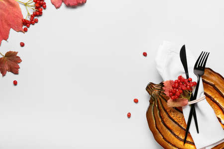 Beautiful table setting for Thanksgiving Day celebration on light backgroundの写真素材