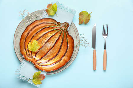 Beautiful table setting for Thanksgiving Day celebration on color backgroundの写真素材