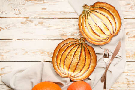 Beautiful table setting for Thanksgiving Day celebration on wooden backgroundの写真素材