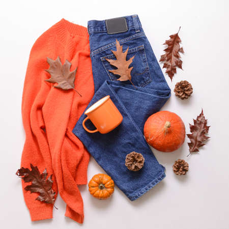 Autumn composition with stylish clothes on white backgroundの写真素材