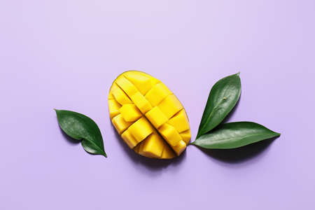 Sweet cut mango on color backgroundの写真素材
