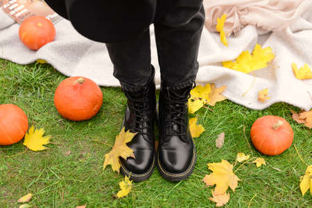 Woman resting in autumn parkの写真素材