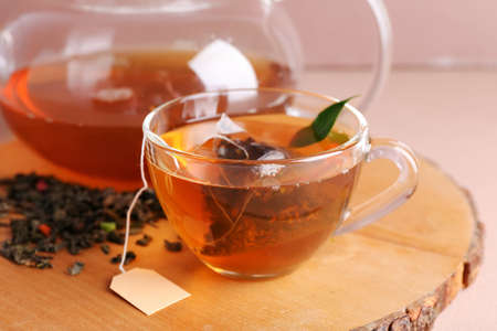 Cup of aromatic black tea, closeup