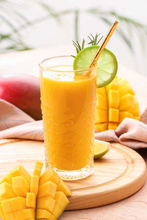 Glass of tasty mango smoothie, closeupの写真素材