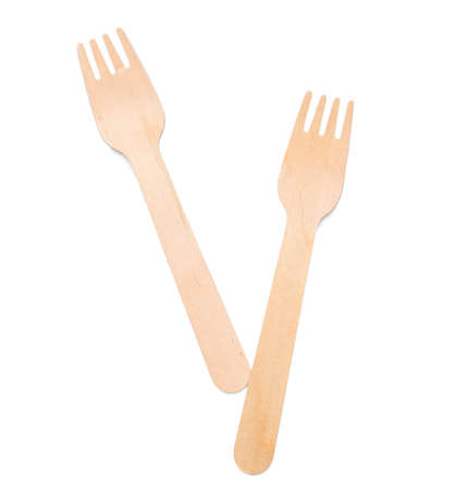 Wooden forks on white background