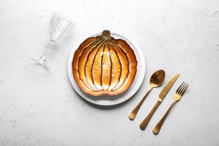 Beautiful table setting for Thanksgiving Day celebration on white backgroundの写真素材