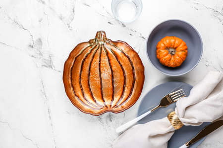 Beautiful table setting for Thanksgiving Day celebration on white backgroundの写真素材