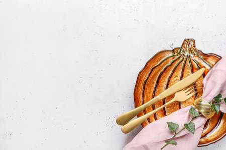 Beautiful table setting for Thanksgiving Day celebration on white backgroundの写真素材