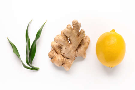 Fresh ginger and lemon on white backgroundの写真素材