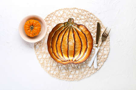 Beautiful table setting for Thanksgiving Day celebration on white backgroundの写真素材