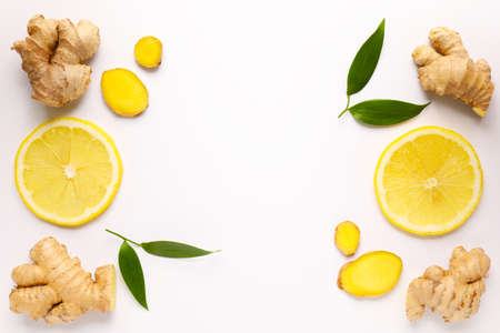 Fresh ginger and lemon on white backgroundの写真素材