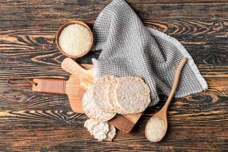 Composition with rice crackers on wooden backgroundの写真素材