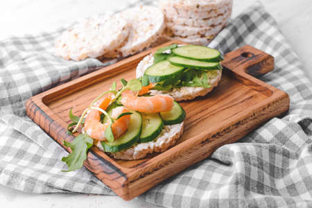 Composition with rice crackers on tableの写真素材