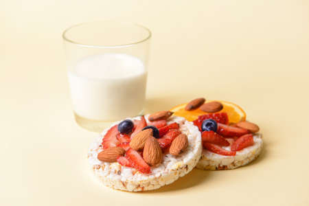 Tasty rice crackers on color backgroundの写真素材