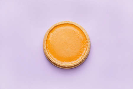 Tasty pumpkin pie on color background, top viewの写真素材