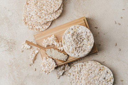 Box with rice crackers on grunge backgroundの写真素材