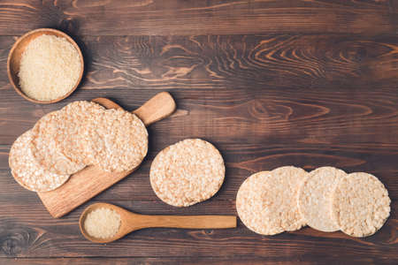 Composition with rice crackers on wooden backgroundの写真素材
