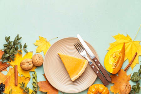 Composition with tasty pumpkin pie on color backgroundの写真素材