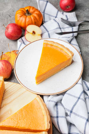 Composition with tasty pumpkin pie on gray backgroundの写真素材