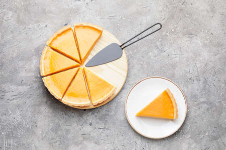 Composition with tasty pumpkin pie on gray backgroundの写真素材