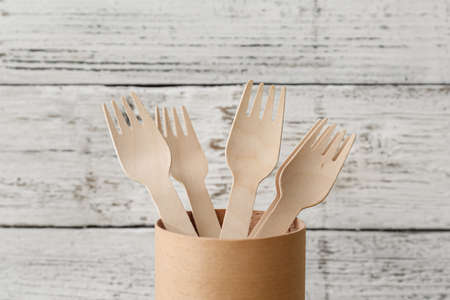 Wooden forks on light backgroundの写真素材